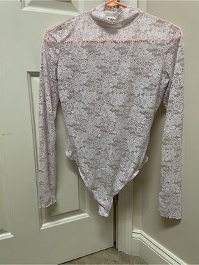 PINK Victoria's Secret Sheer Floral Lace Long-Sleeve Bodysuit in Light Pink